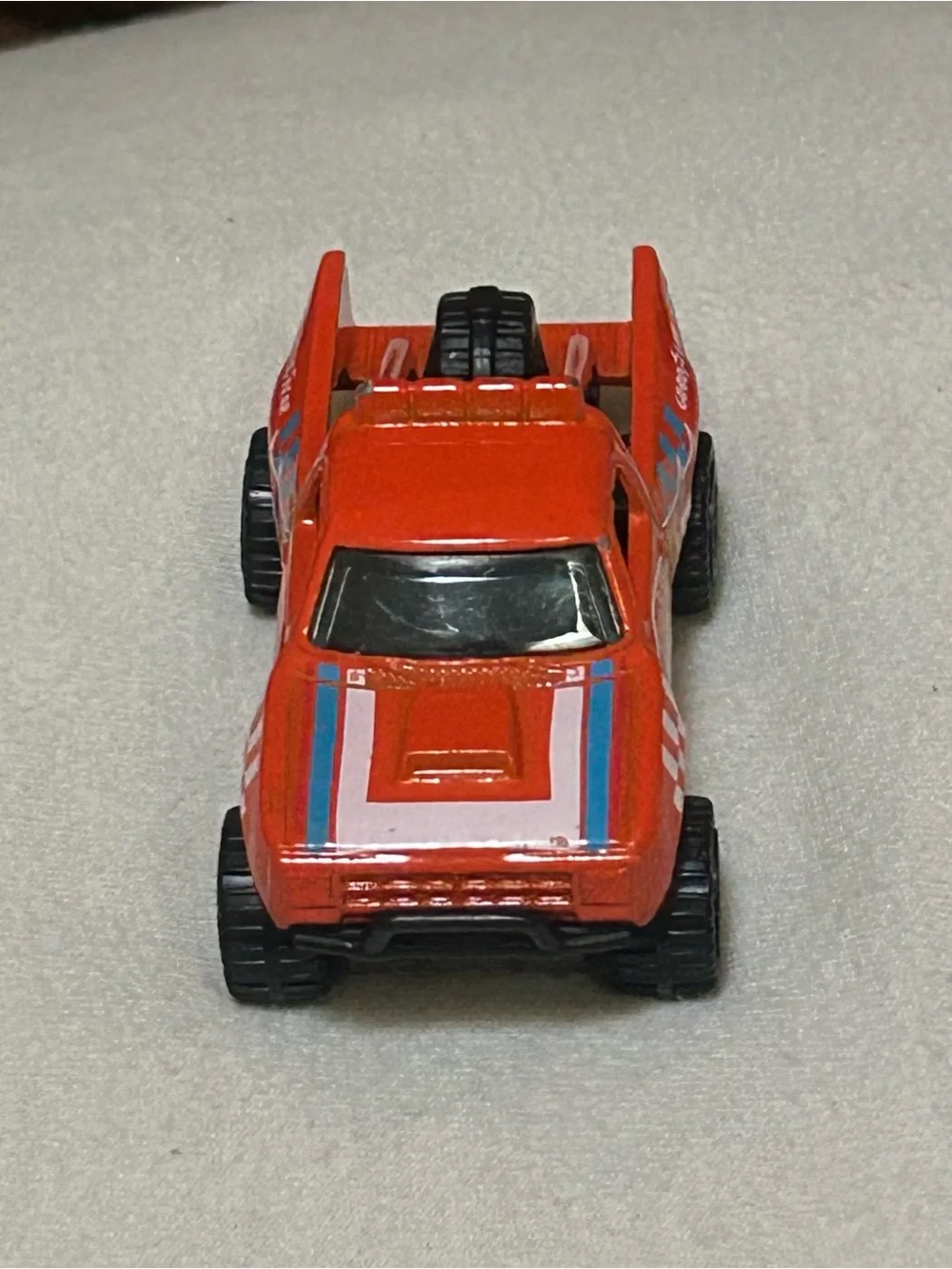Hot Wheels 2021 HW Race Team '87 Dodge D100 Orange Pickup Truck 1:64 Scale